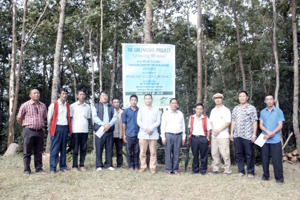 Dr. Imtiwapang Aier, Parliamentary Secretary, Geology and Mining, Nagaland along with members and officials of MALT and Mopungchuket Village council at the launching of the “Greensight Project” at Mopungchuket village, Mokokchung. (Morung Photo)